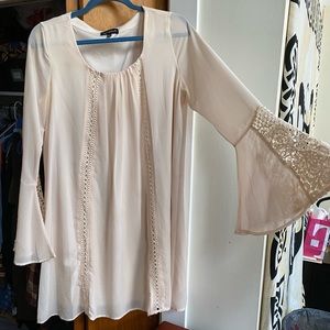 Cream colored lace dress with bell sleeves